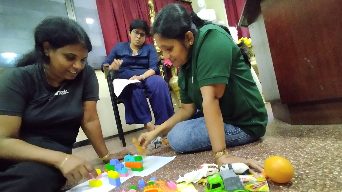 Participants engaged in collaborative play-based practice