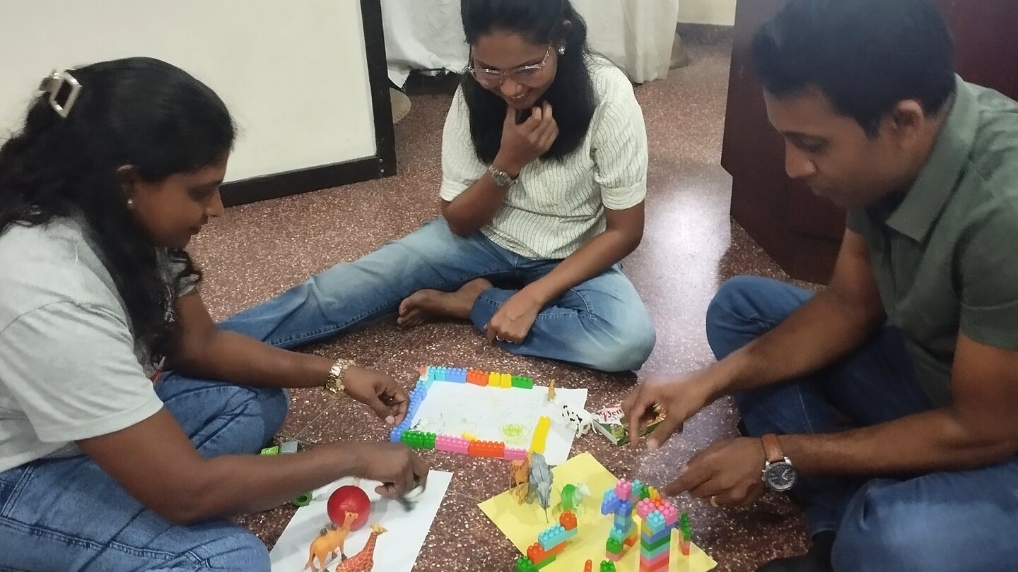 Participants creating a symbolic play scene together